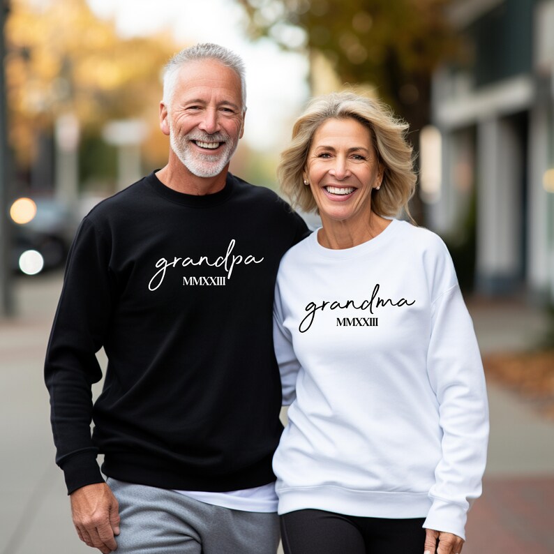 Custom Embossed Grandma Sweatshirt With Grandkids Names On Sleeve, Grandma Est Roman Numerals