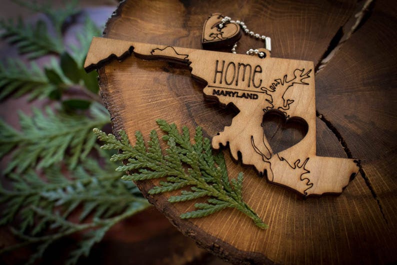 All US State Ornaments Heart & Home Show love for the place that stole your heart with these Ornaments, Keychains, and tokens of love
