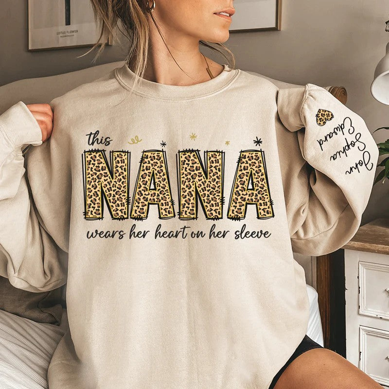 This Nana Wears Her Heart On Her Sleeve - Family Personalized Unisex Sweatshirt With Design On Sleeve - Birthday Gift For Mom, Grandma
