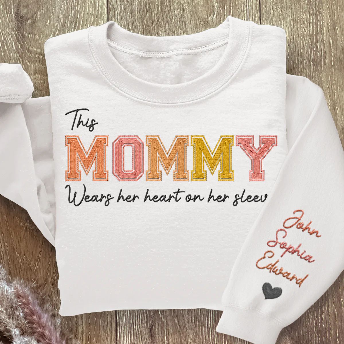 Mommy Wears Her Heart On Her Sleeve - Family Personalized Custom Embroidered Sweatshirt - Gift For Mom, Grandma
