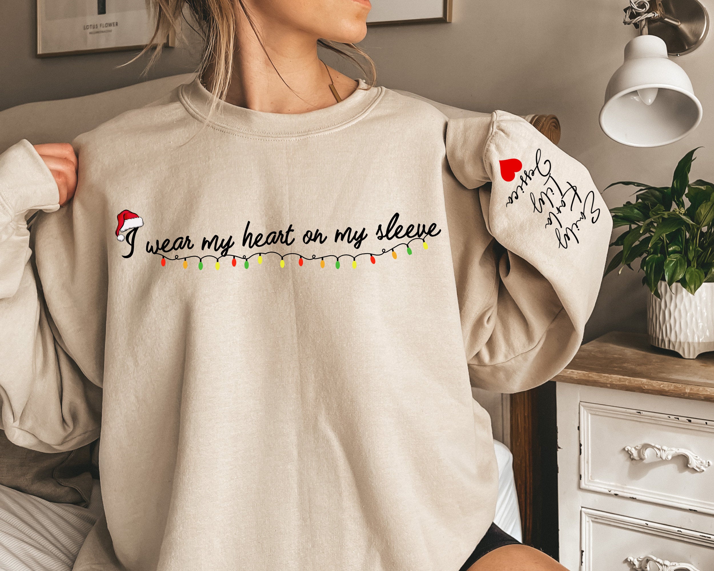 I Wear My Heart On My Sleeve Christmas Sweatshirt with Kids Names on Sleeve, New Mom Gift Personalized, Custom Gifts Mom Christmas