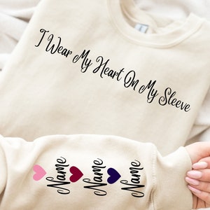 I Wear My Heart On My Sleeve Sweatshirt and Hoodie, Custom Family Gift Hoodie, Gift for Mom, Custom Mama Sweatshirt with Name on Sleeve