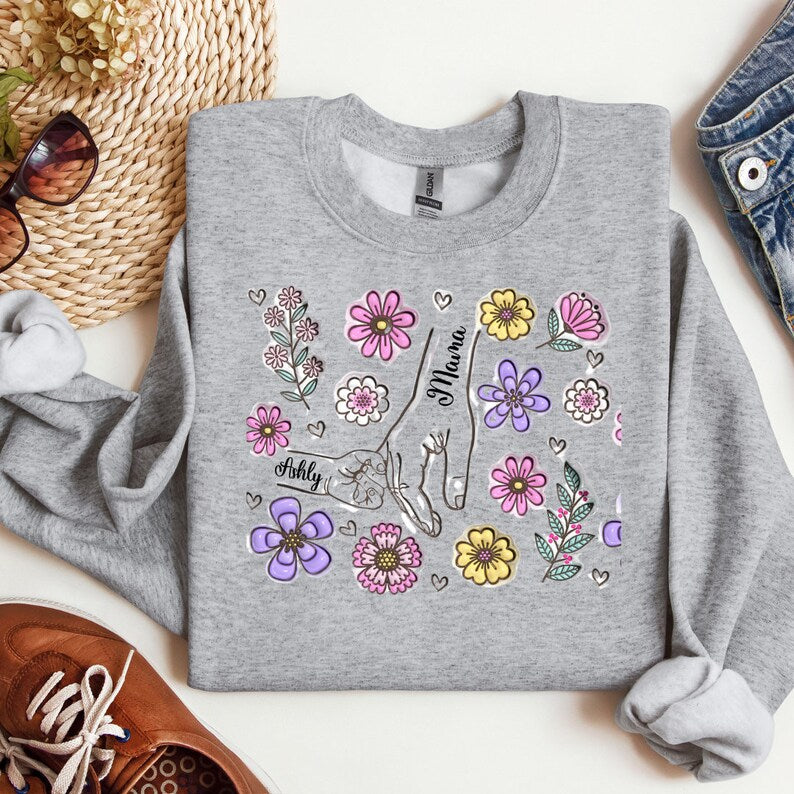 Custom Holding Mom's Hand Sweatshirt With Child's Name On It, You Hold Our Hands Shirt