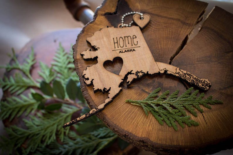 All US State Ornaments Heart & Home Show love for the place that stole your heart with these Ornaments, Keychains, and tokens of love