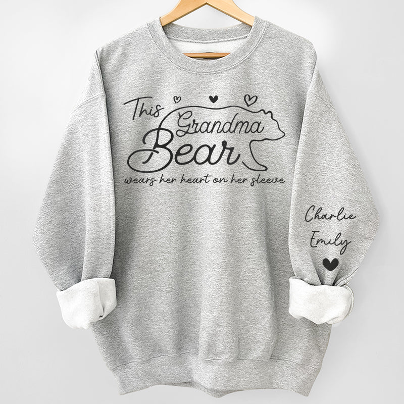 This Mama Bear Wears Her Heart On Her Sleeve - Family Personalized Unisex Sweatshirt With Design On Sleeve - Gift For Mom